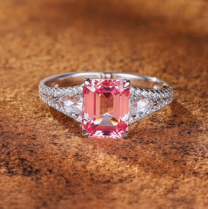 Pinkish-orange emerald-cut luxury ring
