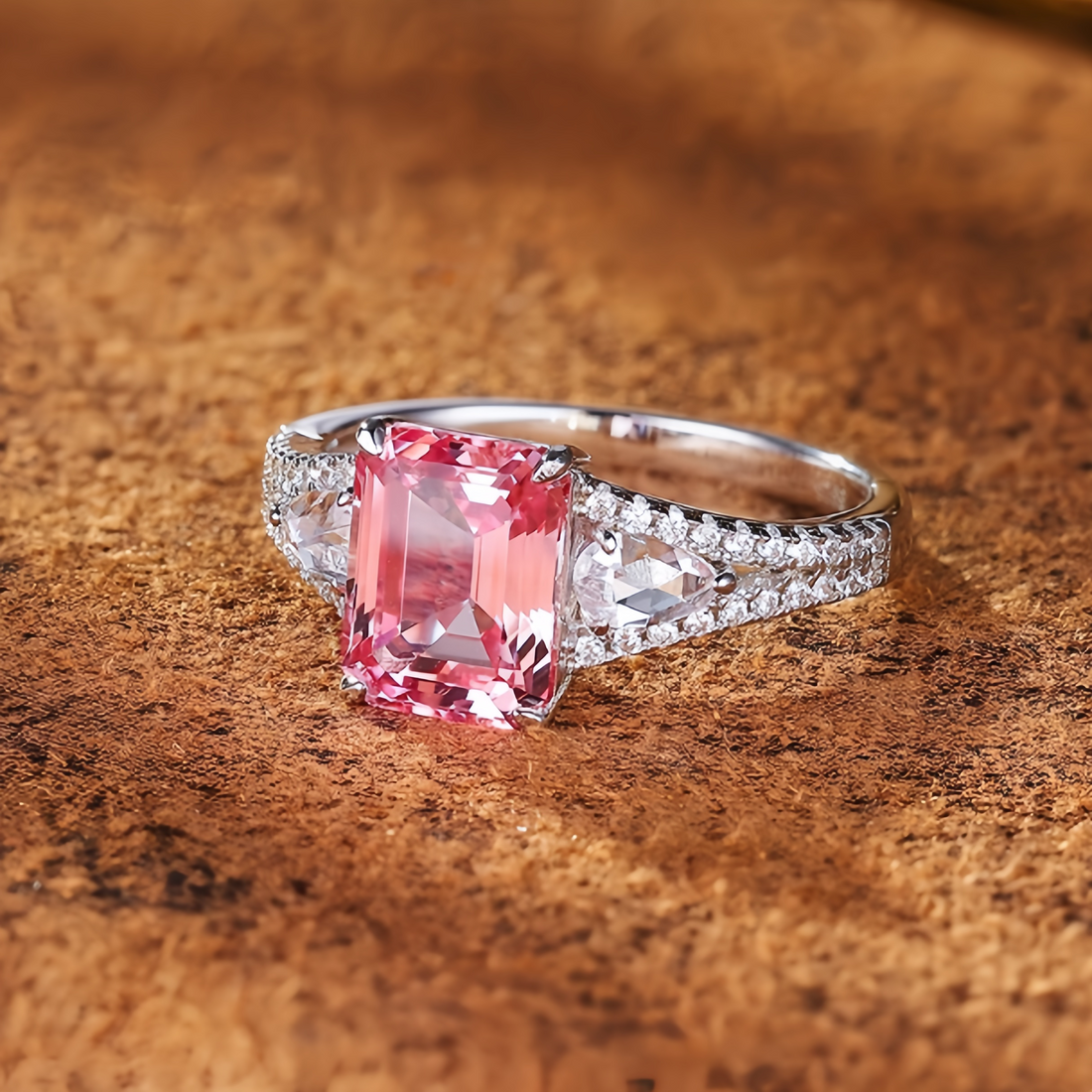 Pinkish-orange emerald-cut luxury ring