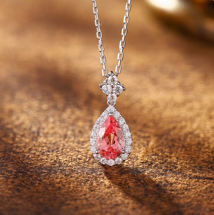 Teardrop-shaped pink gemstone snowflake necklace