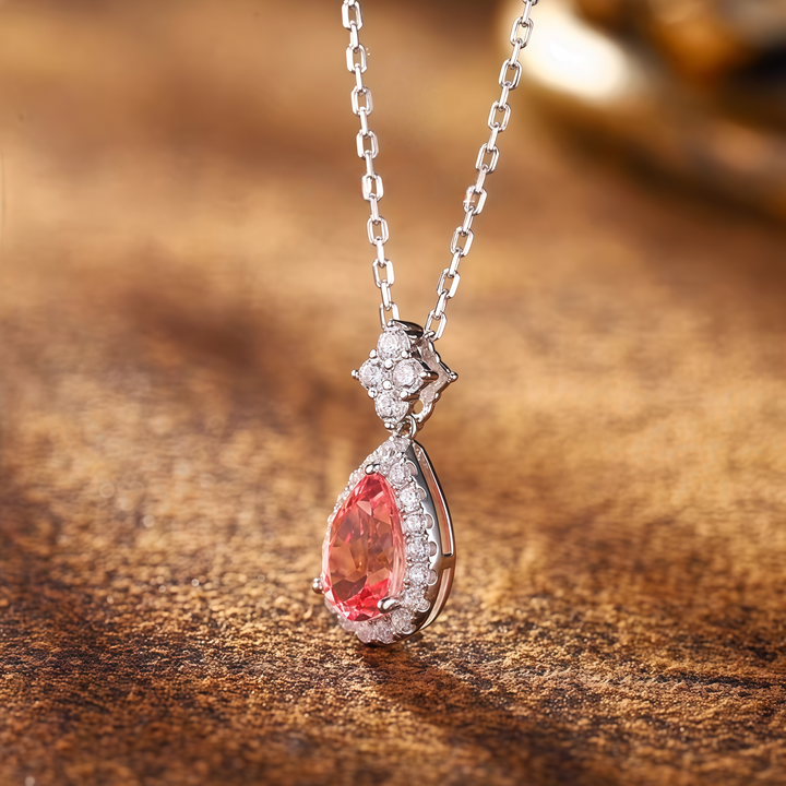 Teardrop-shaped pink gemstone snowflake necklace