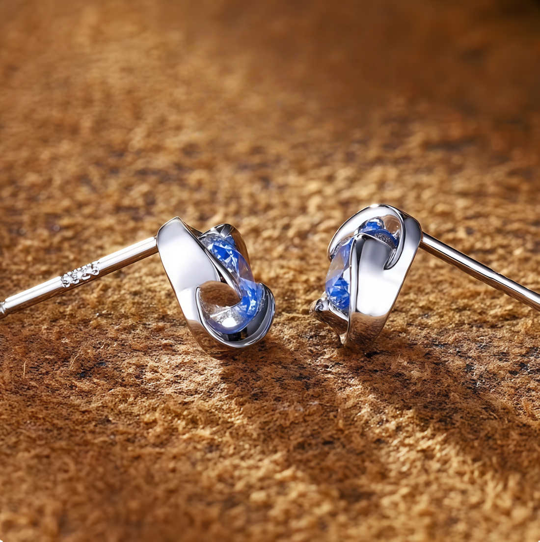 Spiral Light Blue Gem Stud Earrings