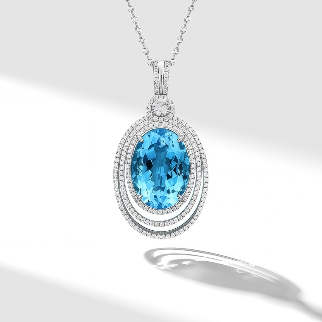 Deep Sea Star Halo – Oval Blue Topaz Necklace