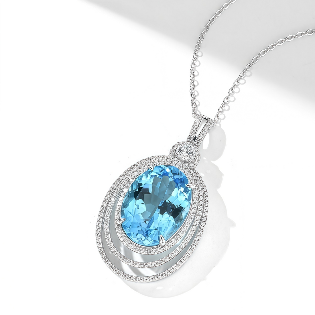 Deep Sea Star Halo – Oval Blue Topaz Necklace
