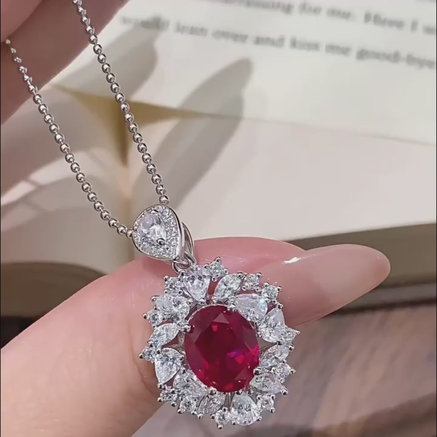 “Crown of Passion” Oval-Cut Ruby Halo Pendant